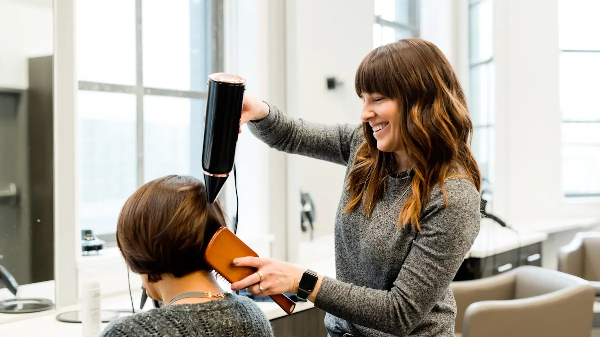 Hair stylist with tools at Prosper TX salon